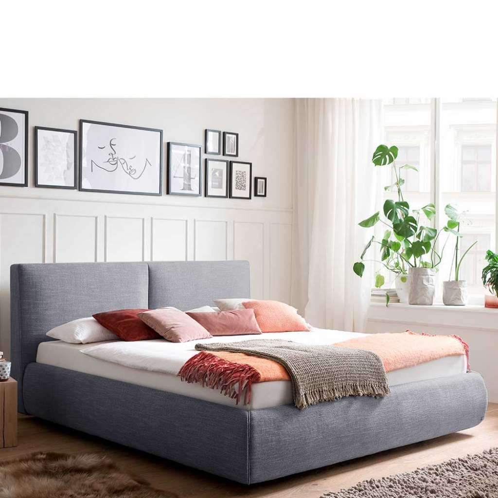 Gepolstertes Bett in Blau Webstoff Bettkasten