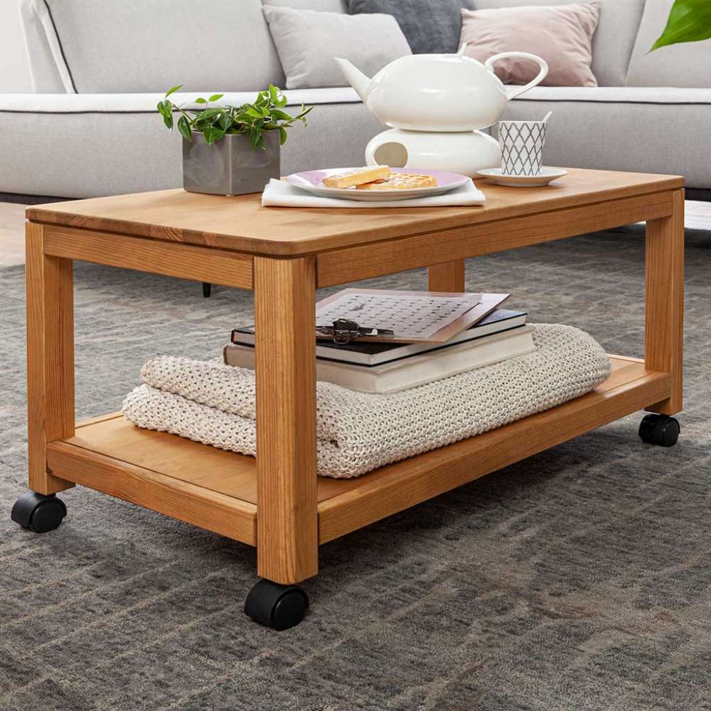 Rollbarer Wohnzimmertisch aus Kiefer Massivholz Landhausstil