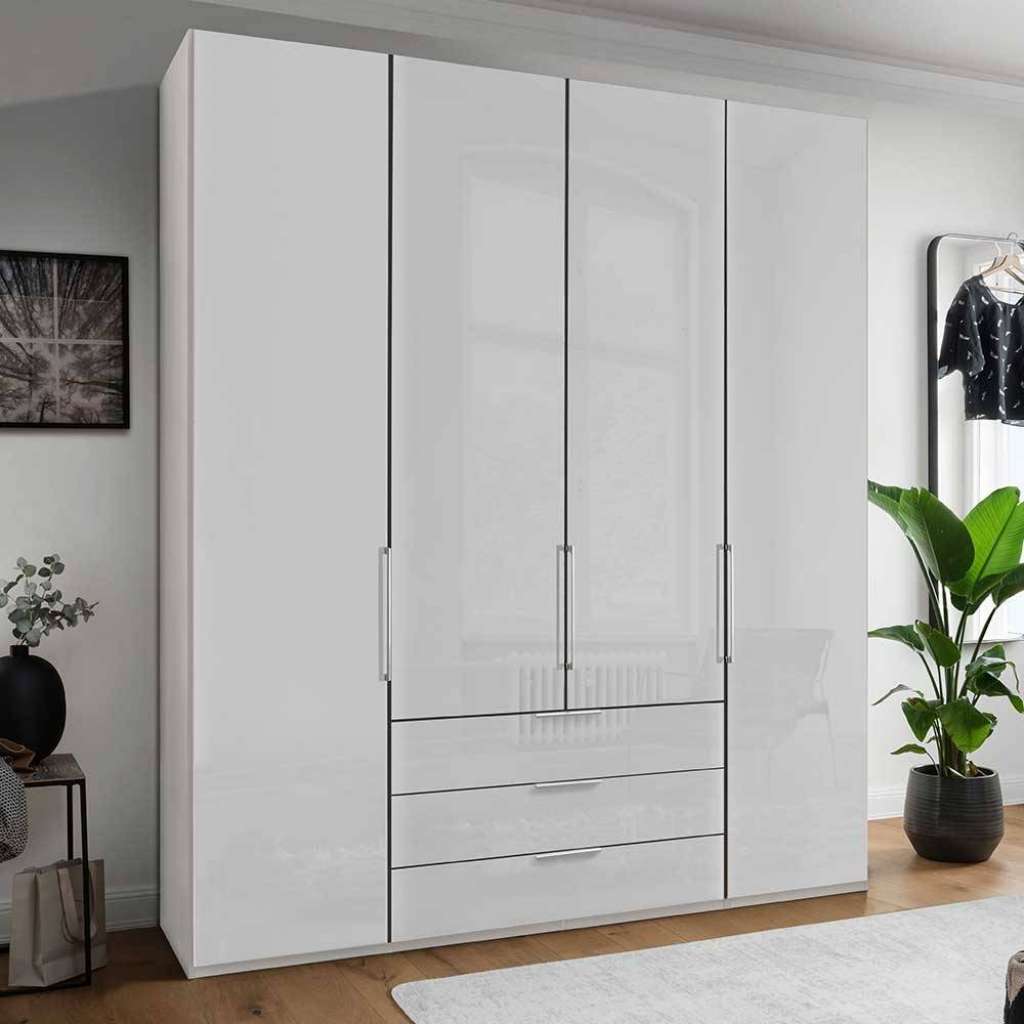 Weißer Kleiderschrank mit Dreh- und Falttüren drei Schubladen