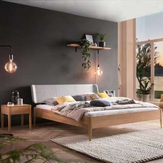 Doppelbett Eiche hell massiv in modernem Design mit Polsterkopfteil in Grau