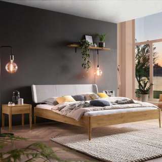 Wildeiche massiv Doppelbett in modernem Design mit Polsterkopfteil in Grau