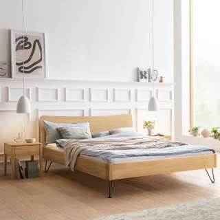 Eiche hell geölt Bett in modernem Design Vierfußgestell aus Metall