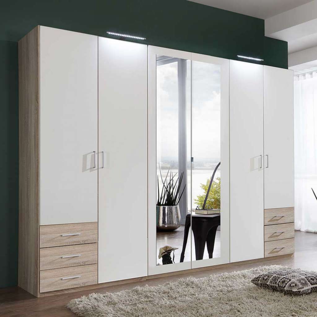 XL Drehtürenkleiderschrank in Eiche Sägerau und Weiß sechs Schubladen