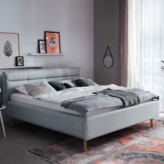 Gepolstertes Bett Grau Stoff mit Vierfußgestell aus Eiche Bettkasten