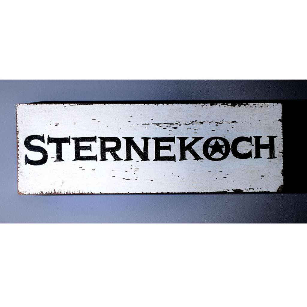 Holzschild mit Aufschrift Schwarz Weiß