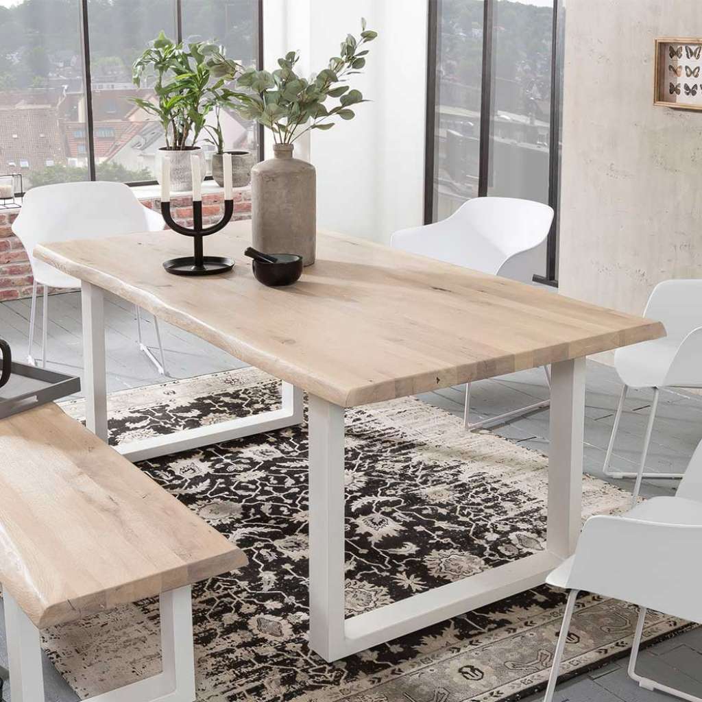 Baumkanten Esszimmertisch aus Eiche White Wash massiv Bügelgestell in Weiß